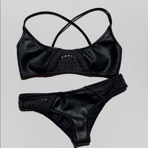 Rip Curl surfing bikini in black leather look.